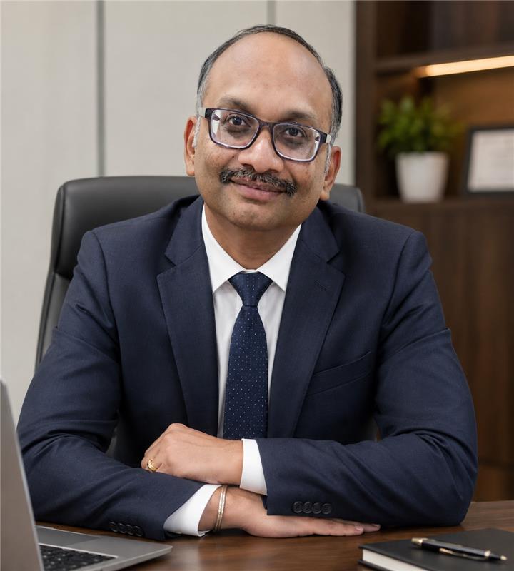 Portrait of Mahesh Balaji, Chief People & Compliance Officer at KEAAS